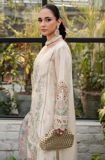 e3 Stylish summer ensemble with delicate pink and green floral embroidery, crochet lace sleeves, and a soft, flowing dupatta.
