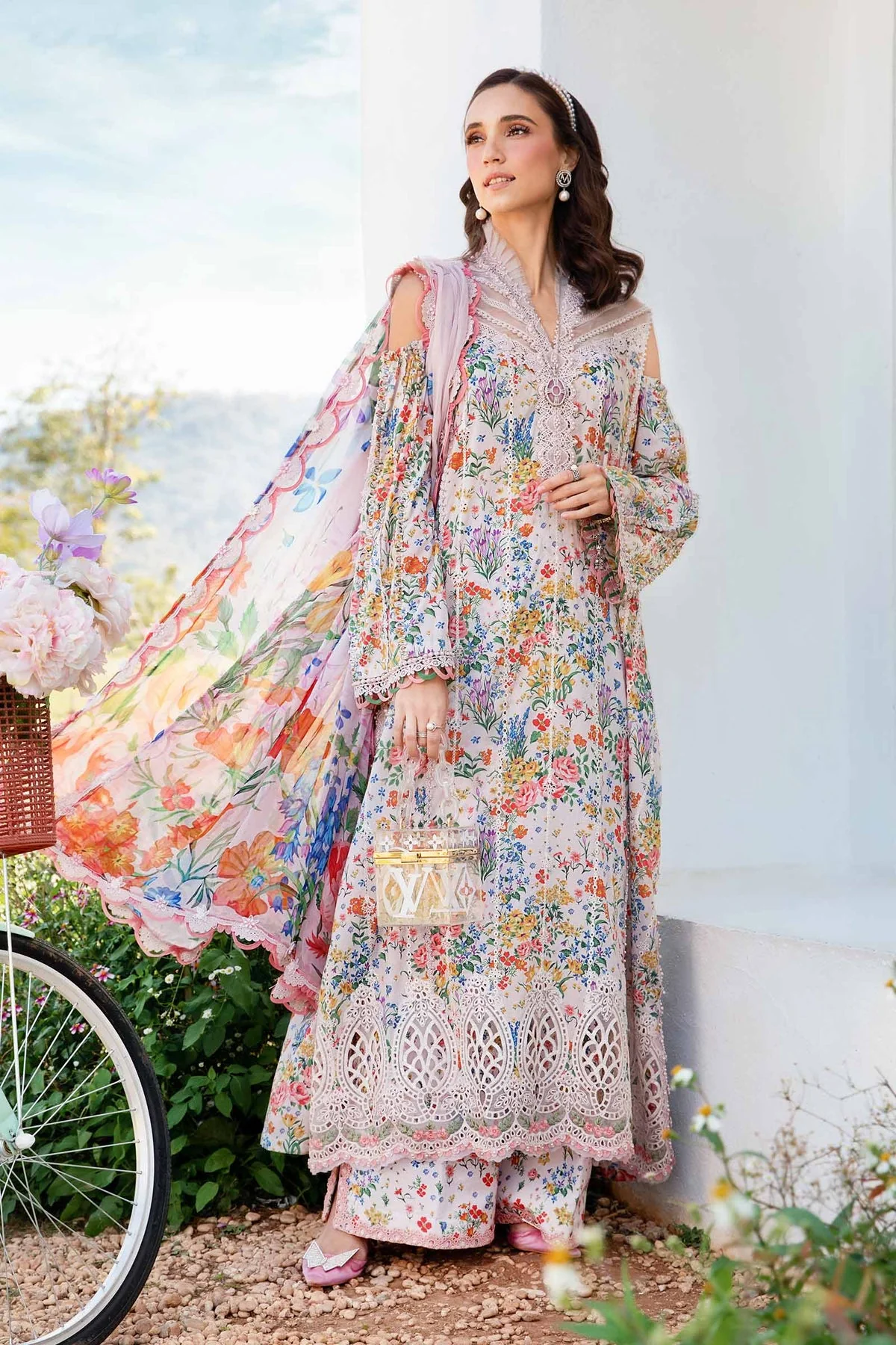 Elegant Pakistani floral lawn suit with embroidered detailing – summer fashion 2025