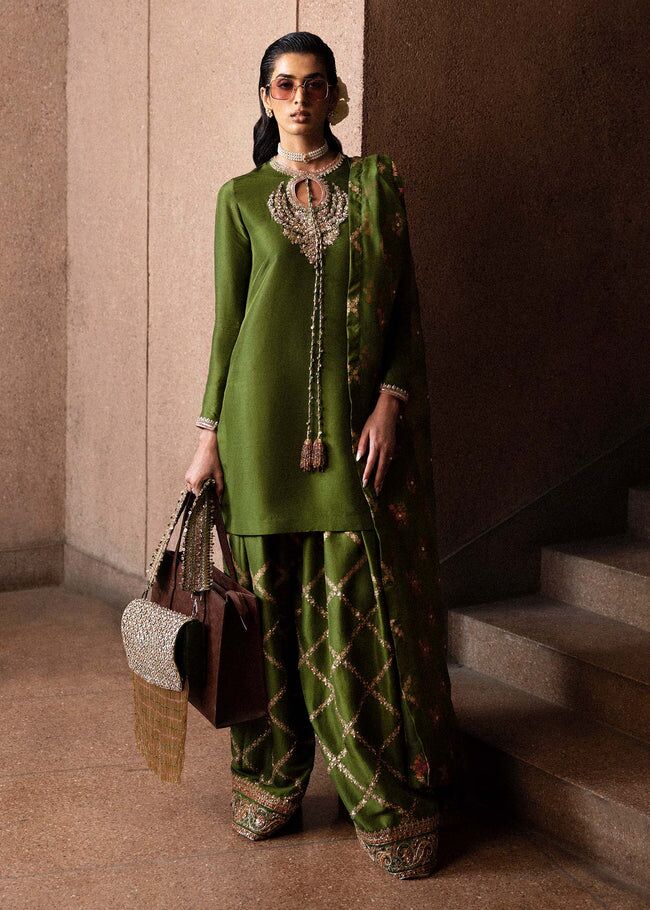 Hussain Rehar olive embroidered outfit with intricate detailing for weddings.