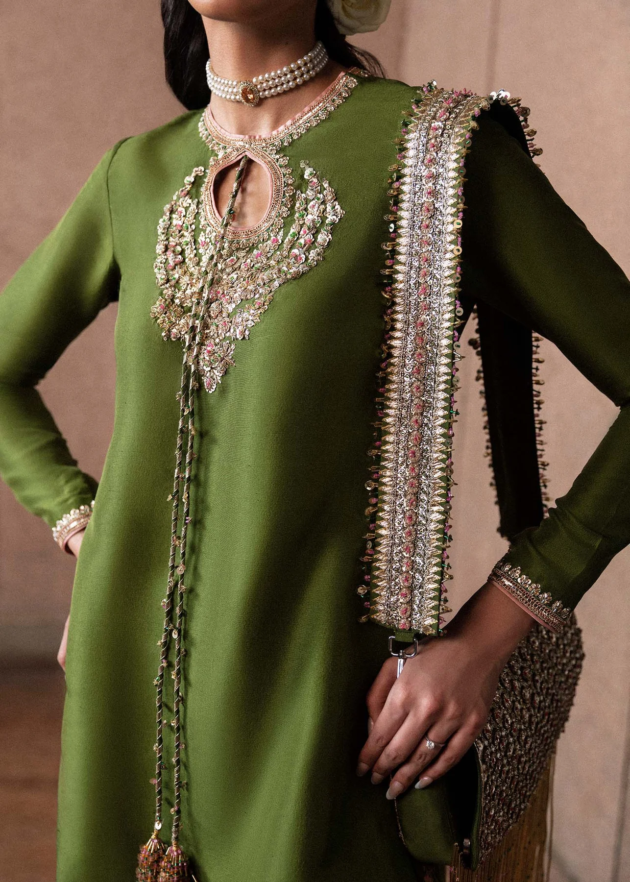 Premium Olive Green Festive Wear for Women Elegant olive green embroidered outfit for festive gatherings.