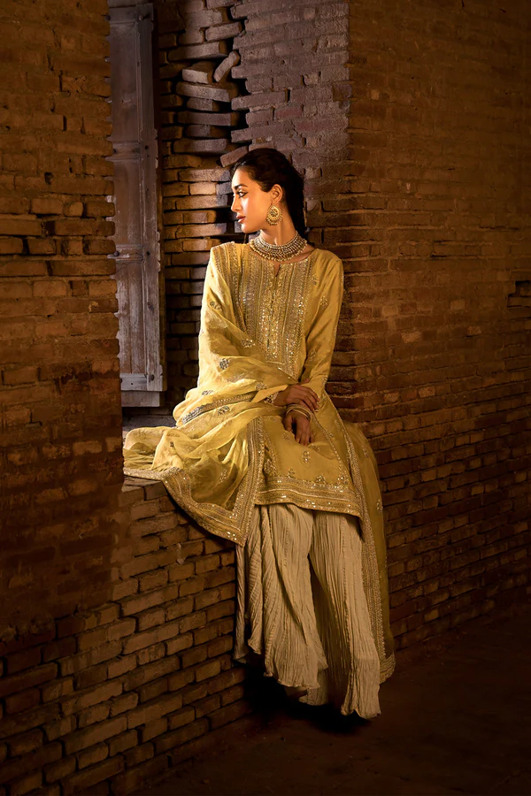 Elegant Festive Wear with Dupatta and Palazzo Traditional formal outfit with hand embellishments and palazzo pants.