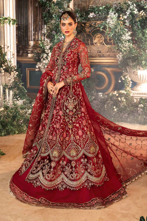 Wedding gown in rich red with intricate embroidery, elegant dupatta, and regal bridal design.