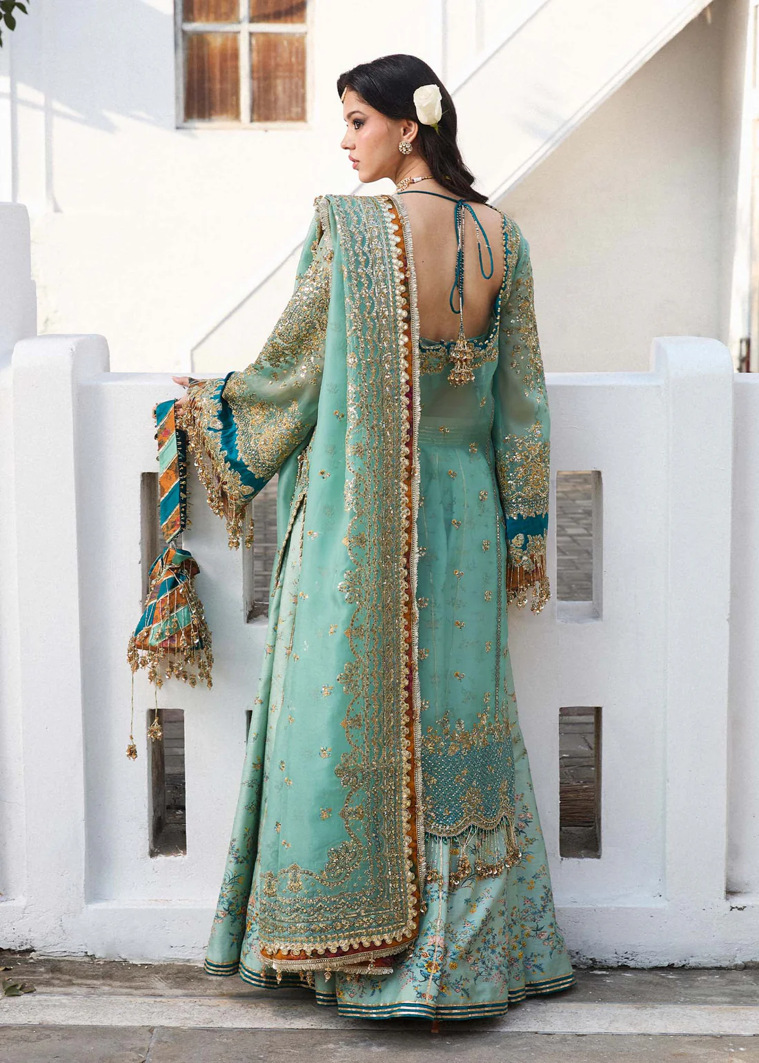 Luxury Formal Pakistani Dress with Hand Embroidery & Back Design Elegant embroidered chiffon outfit with intricate detailing and tassel pouch