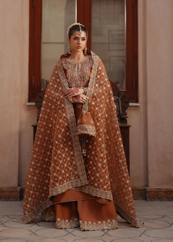 Kanwal Malik Rust Chiffon Dress Gorgeous bridal wear from Elan in warm rust colors with detailed finity.