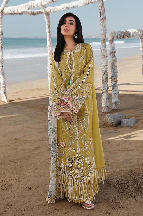 Elegant mustard Eid outfit featuring flowing silhouette and delicate details. Elegant mustard Eid outfit featuring flowing silhouette and delicate details.