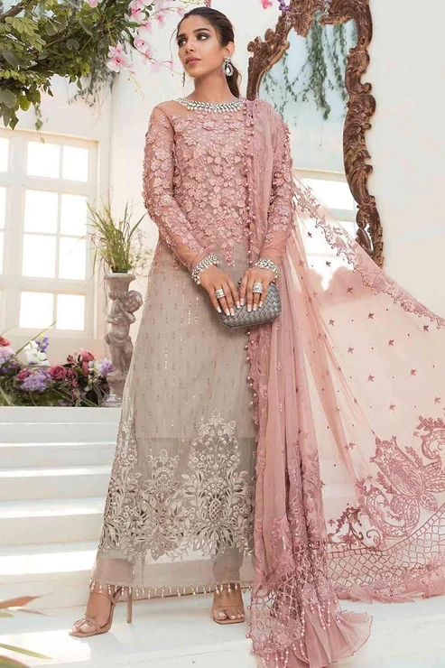Luxury Designer Formal Dress Featuring Floral Embroidered Design Luxury designer formal dress inspired by top garments brands in pakistan featuring embroidery