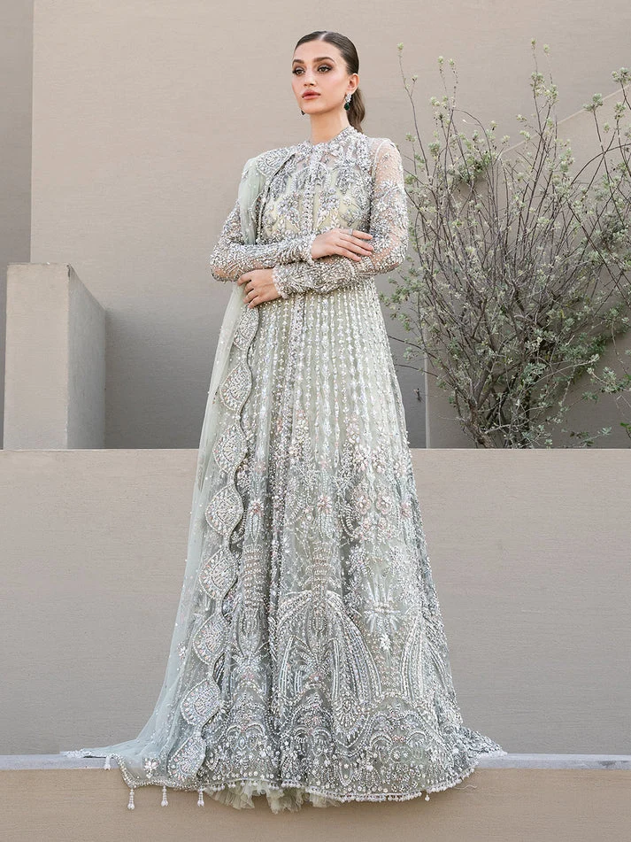 embroidered dress paksitani Designer model in mint flared Pakistani bridal outfit for wedding party, paired with scalloped dupatta.