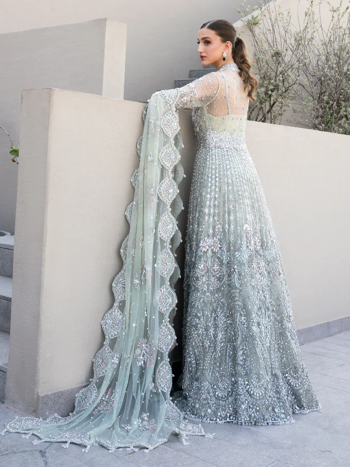 fancy dress Highly embellished silver front-open floor length gown with zardozi work and pearl details.